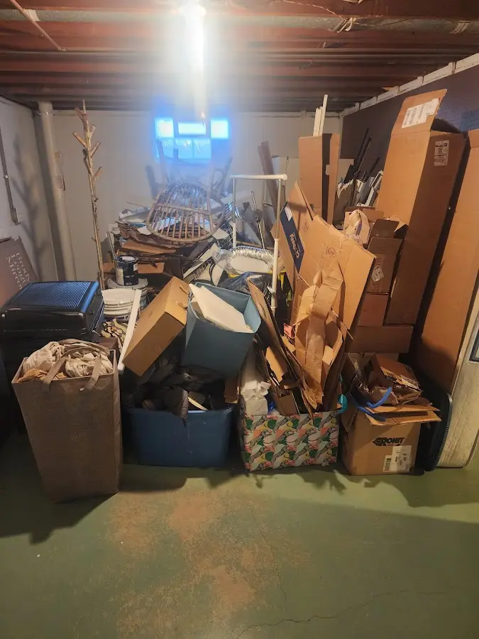 Roll-off dumpster container at job site for Construction Dumpster Rental in Davenport